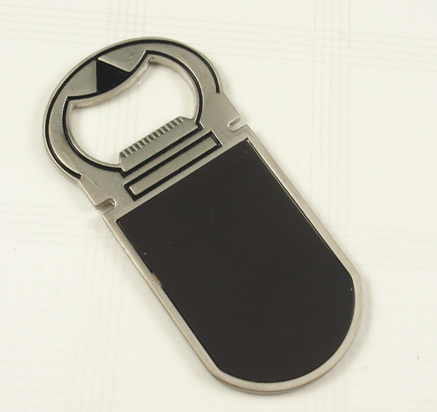 Metal bottle opener and fridge magnet souvenir