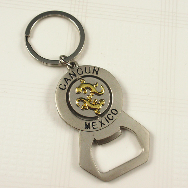 Rotating bottle opener keychain with Mexico logo
